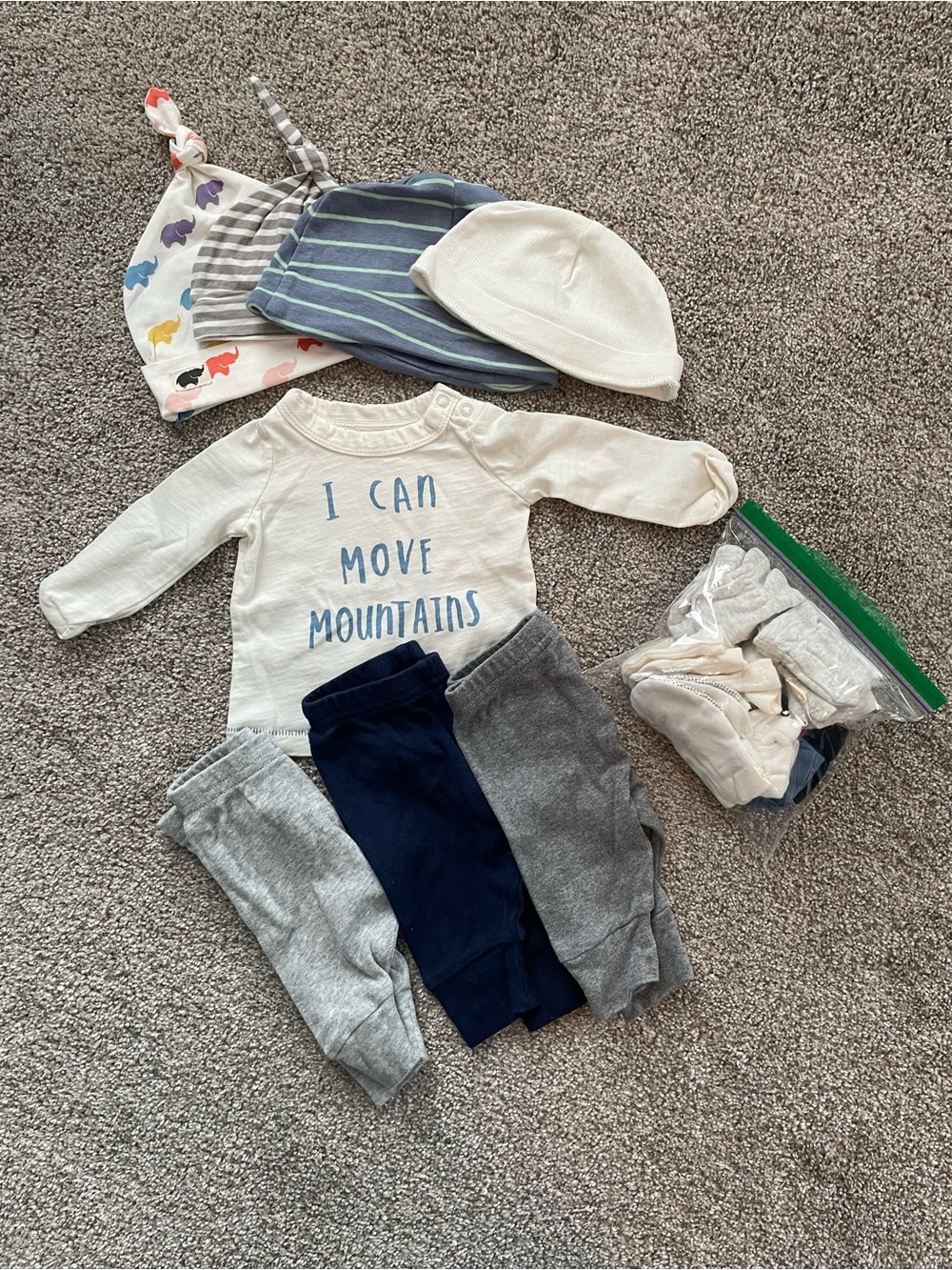 Baby Outfit Set with 'I Can Move Mountains' Top - 3 pants, 4 hats and mittens.